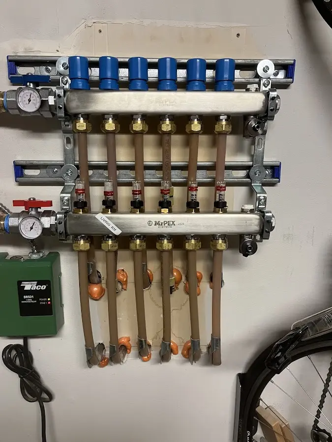 Plumber performing Water Heater Repair at a residential property in New Brighton